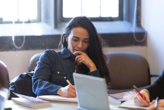 Student Taking Notes