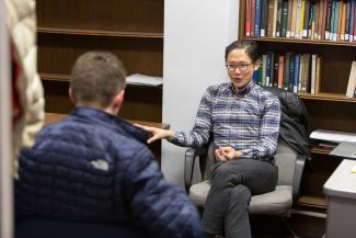 MAPH preceptor, Darrel Chia, meeting with a student